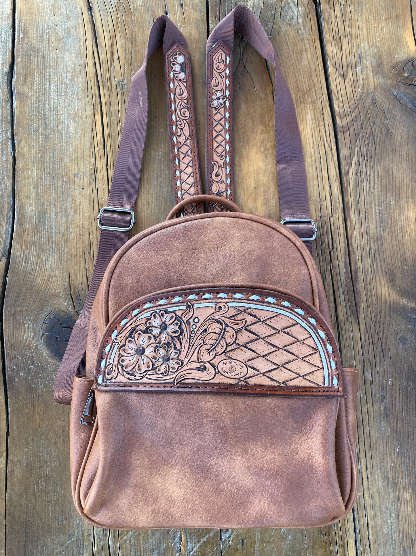 Backpack/purse with floral leather patches