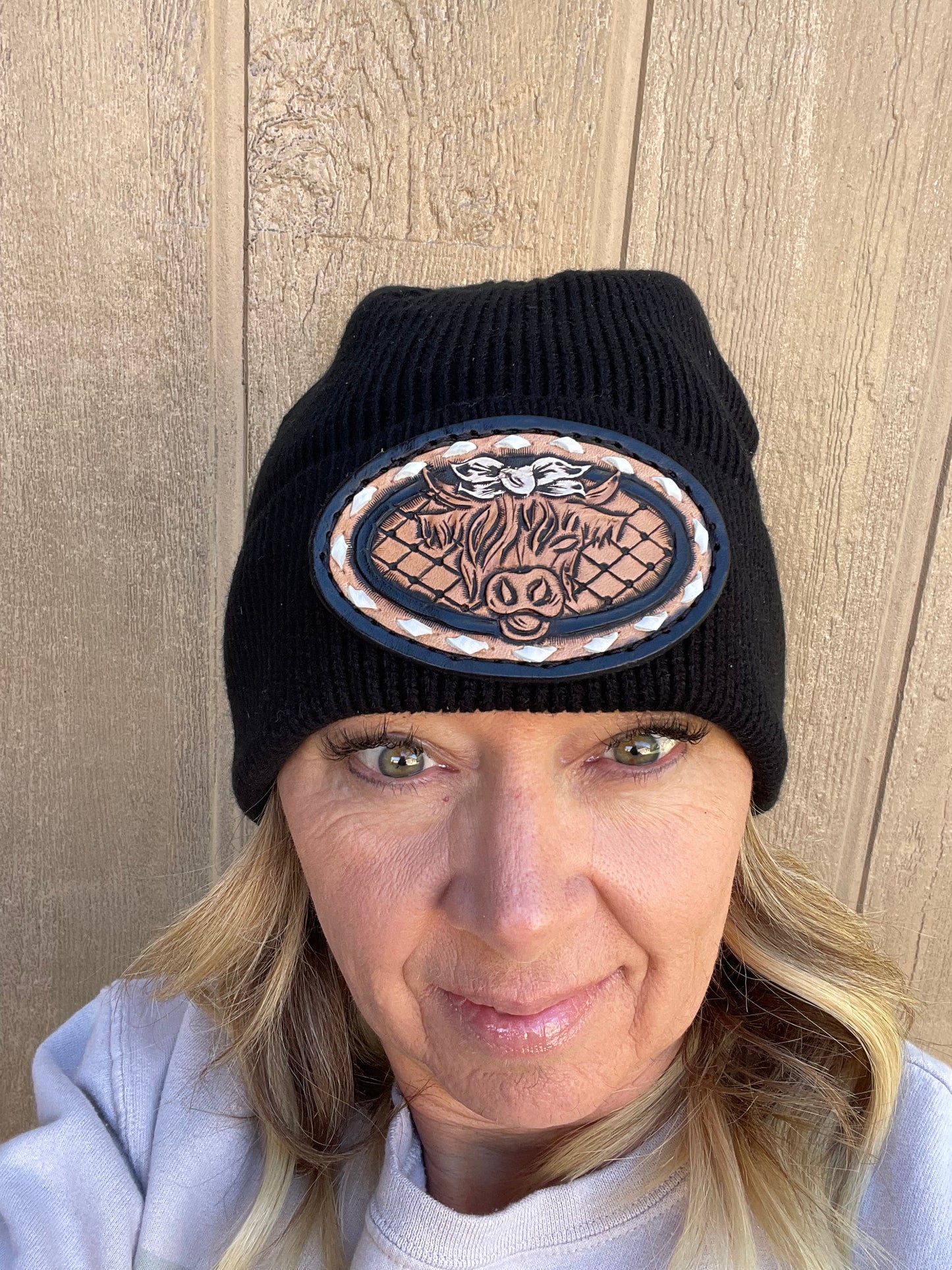 Black beanie with highlander and white buck stitch