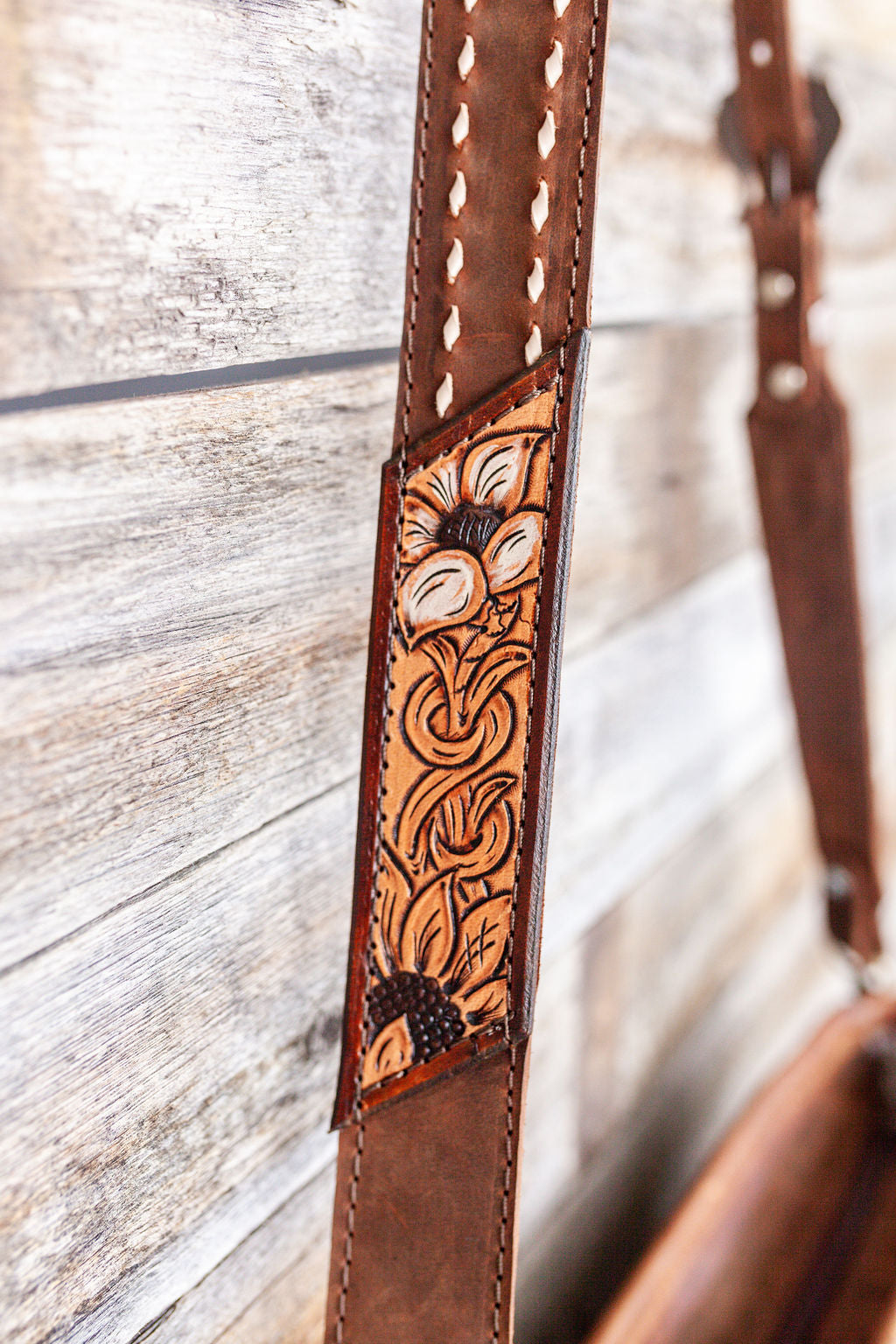 Purse with turquoise/maroon inlay, multicolored fringe & floral leather patch