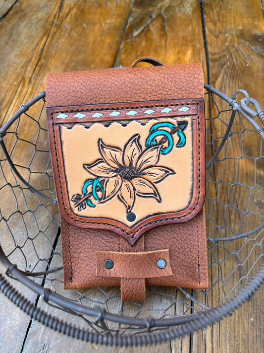 Saddle pouch cell phone holder