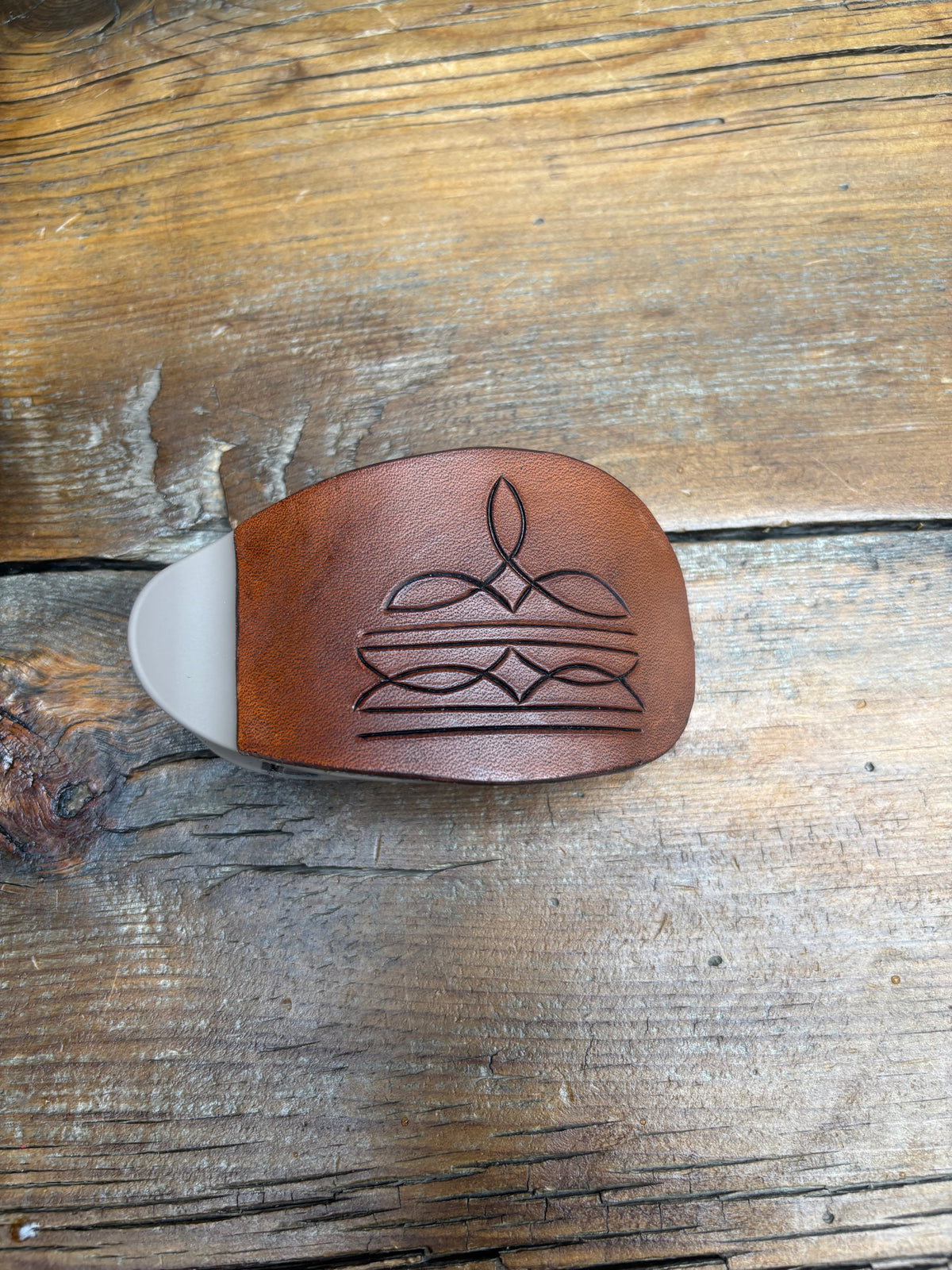 Oval claw clip brown boot stitch