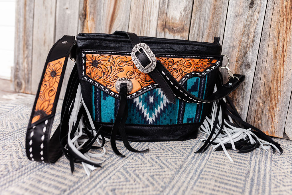 Purse with turquoise/black inlay, black & white fringe & floral leather patch