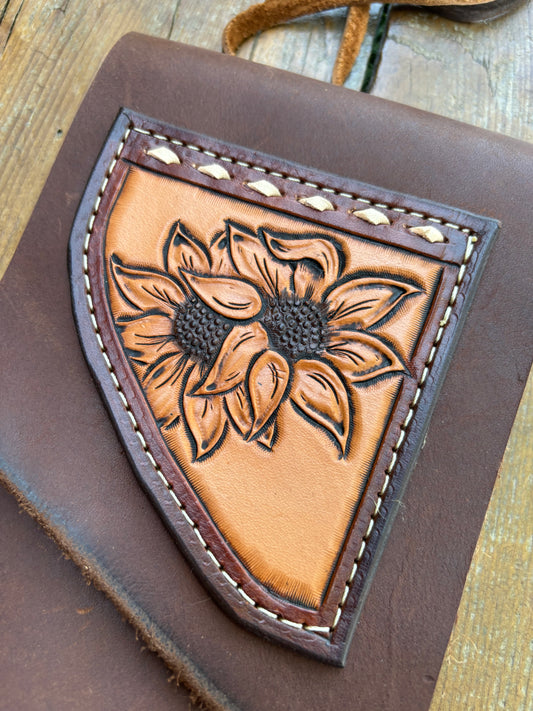 Saddle pouch cell phone holder