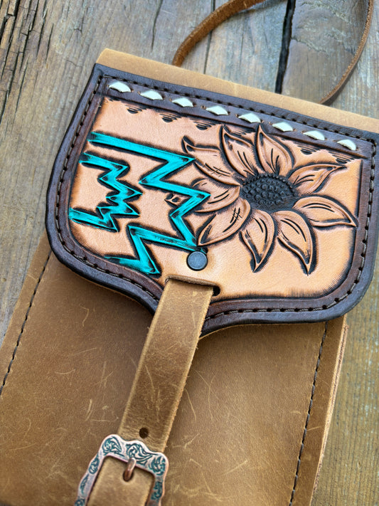 Saddle pouch cell phone holder