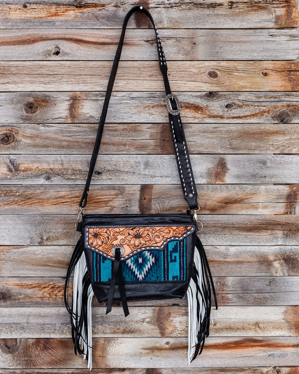 Purse with turquoise/black inlay, black & white fringe & floral leather patch