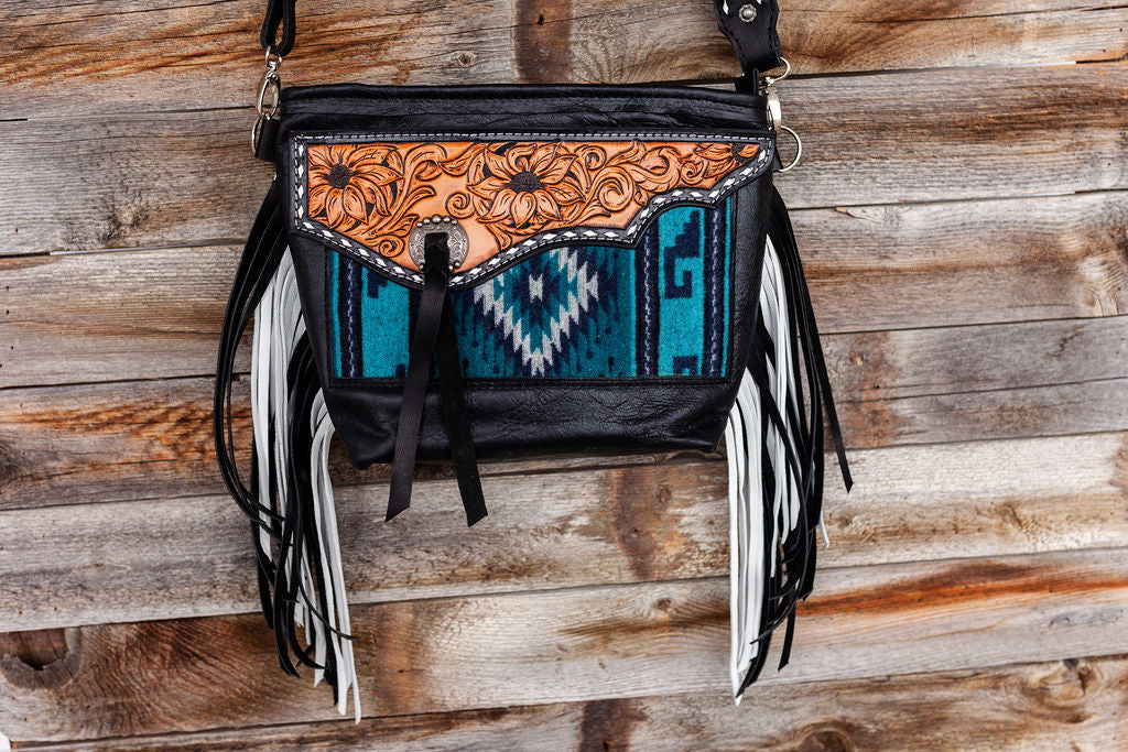 Purse with turquoise/black inlay, black & white fringe & floral leather patch