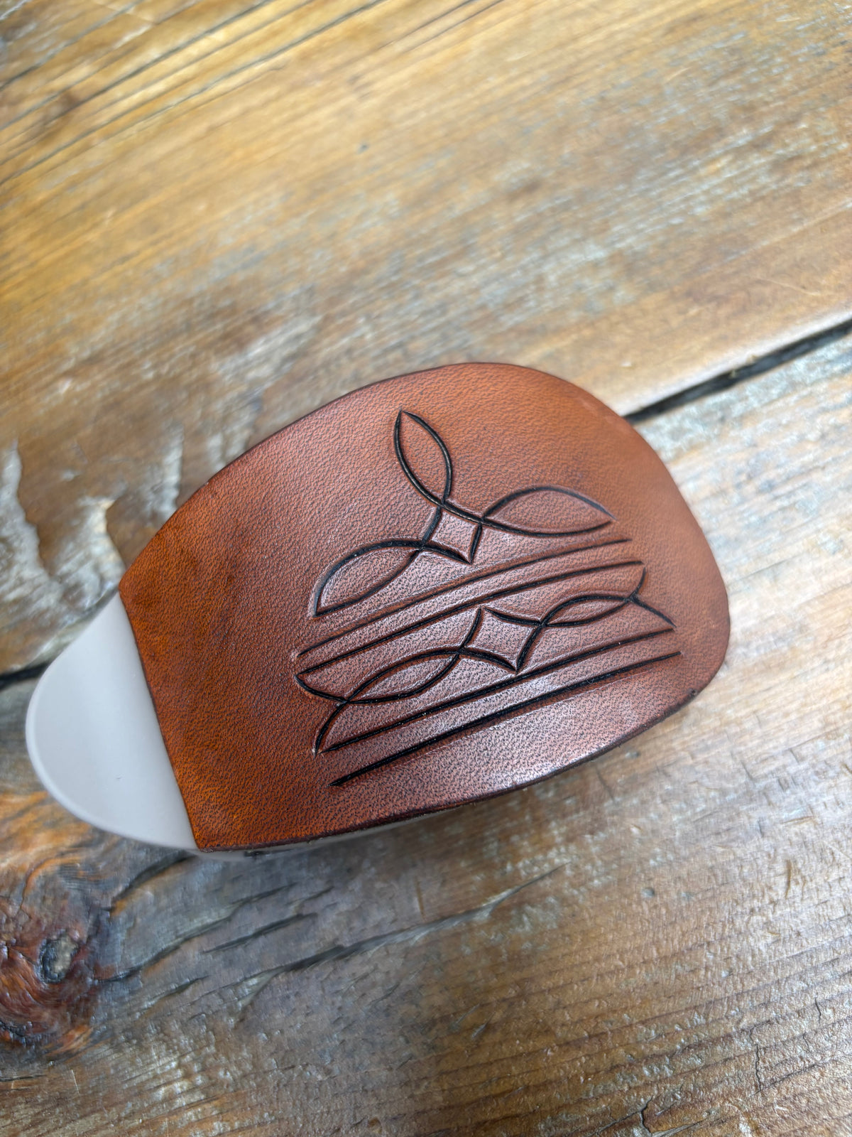 Oval claw clip brown boot stitch