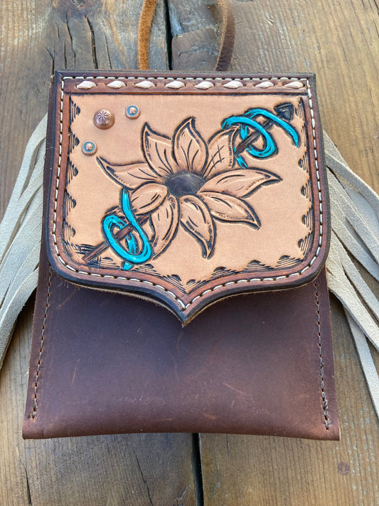 Saddle pouch cell phone holder