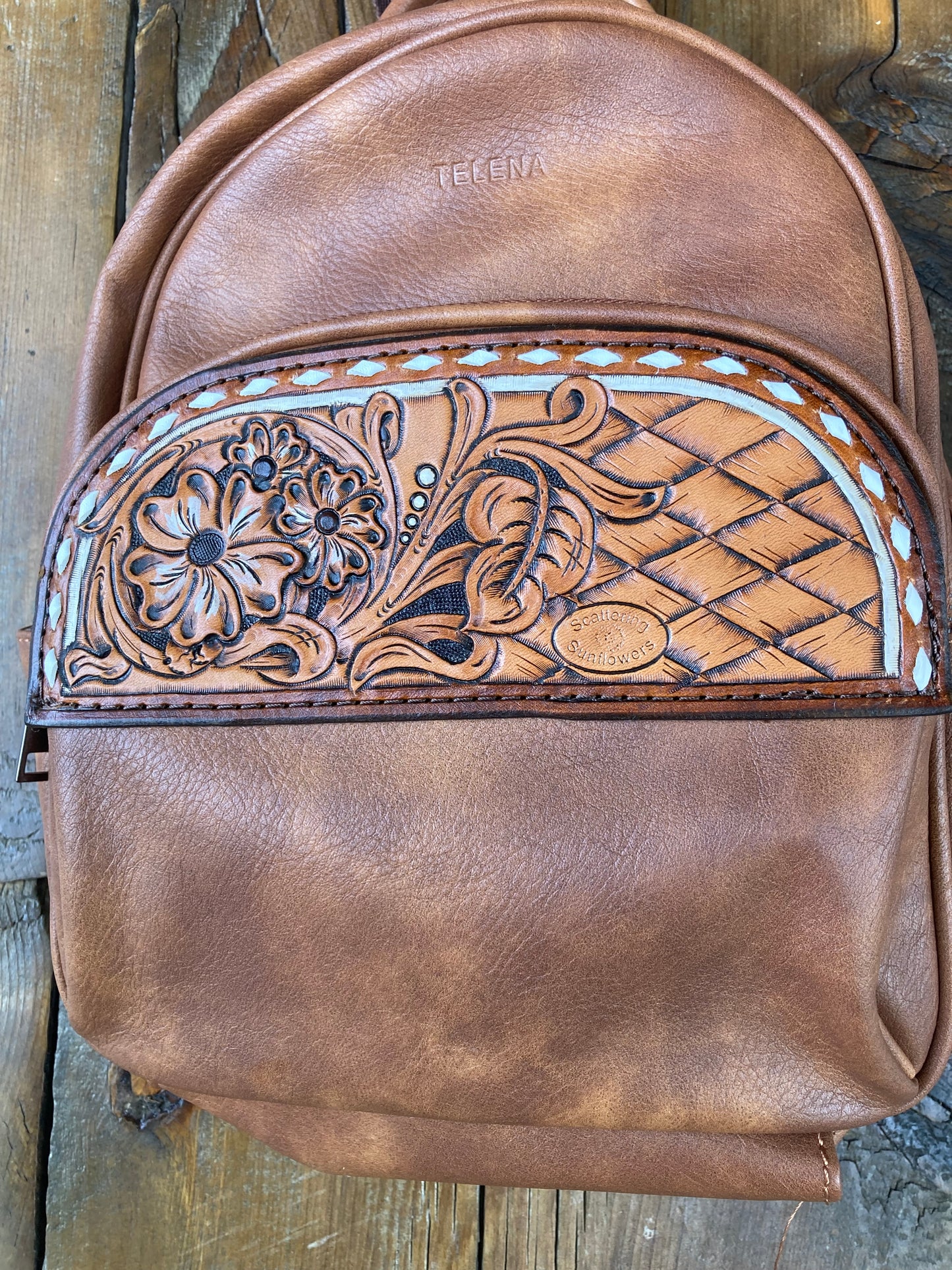 Backpack/purse with floral leather patches