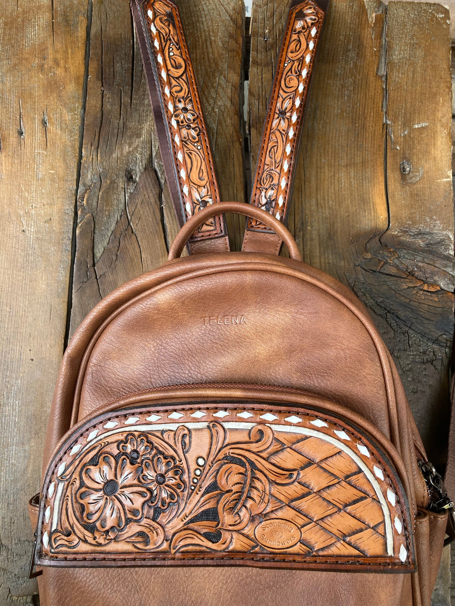 Backpack/purse with floral leather patches