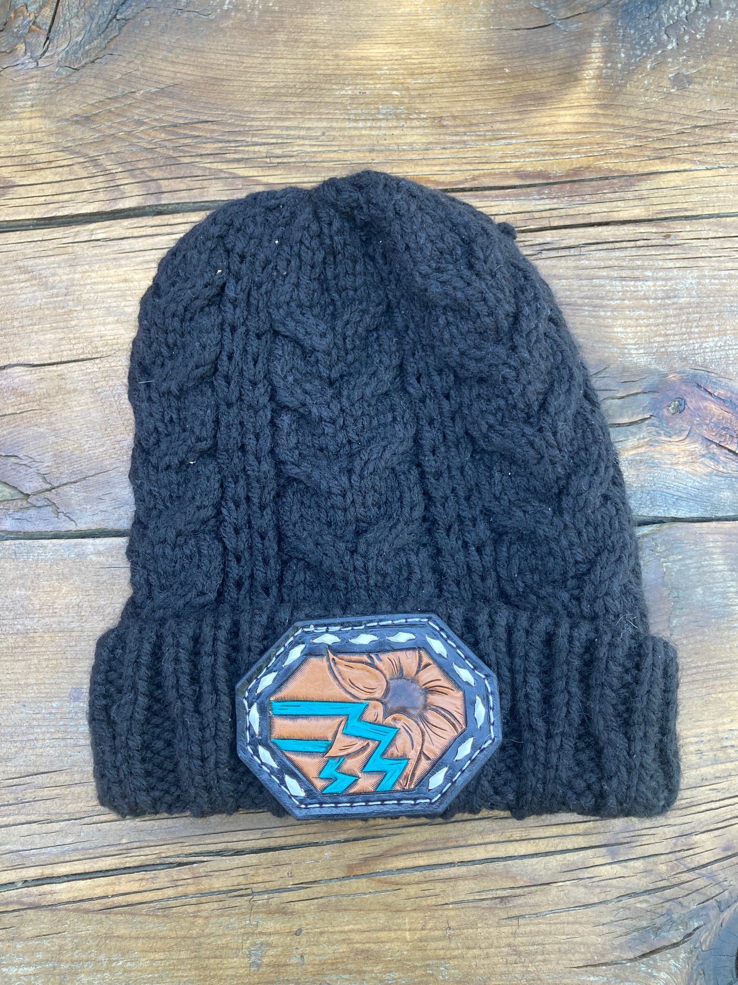 Black beanie with sunflower leather patch