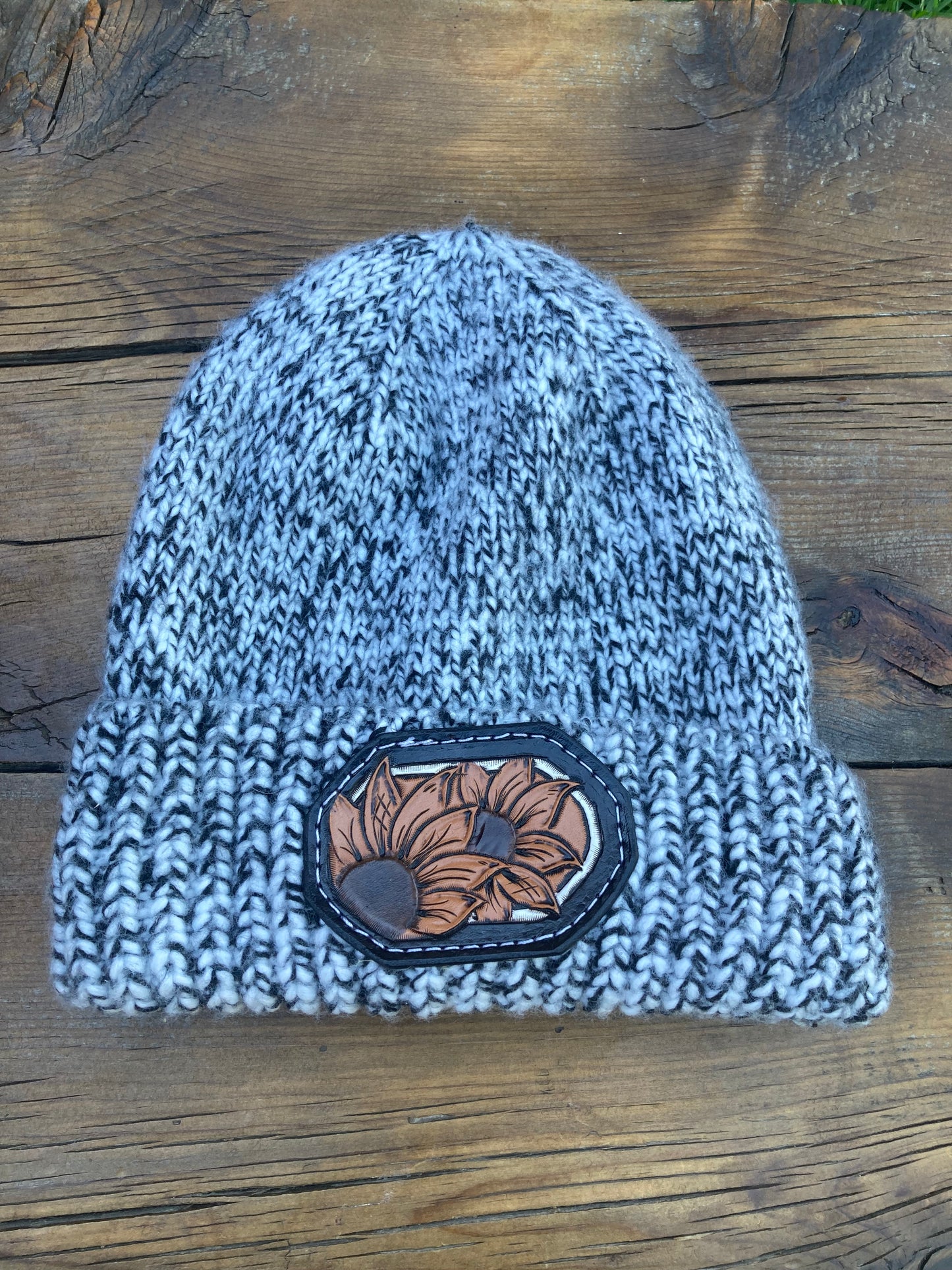 Black & white variegated beanie with sunflower leather patch