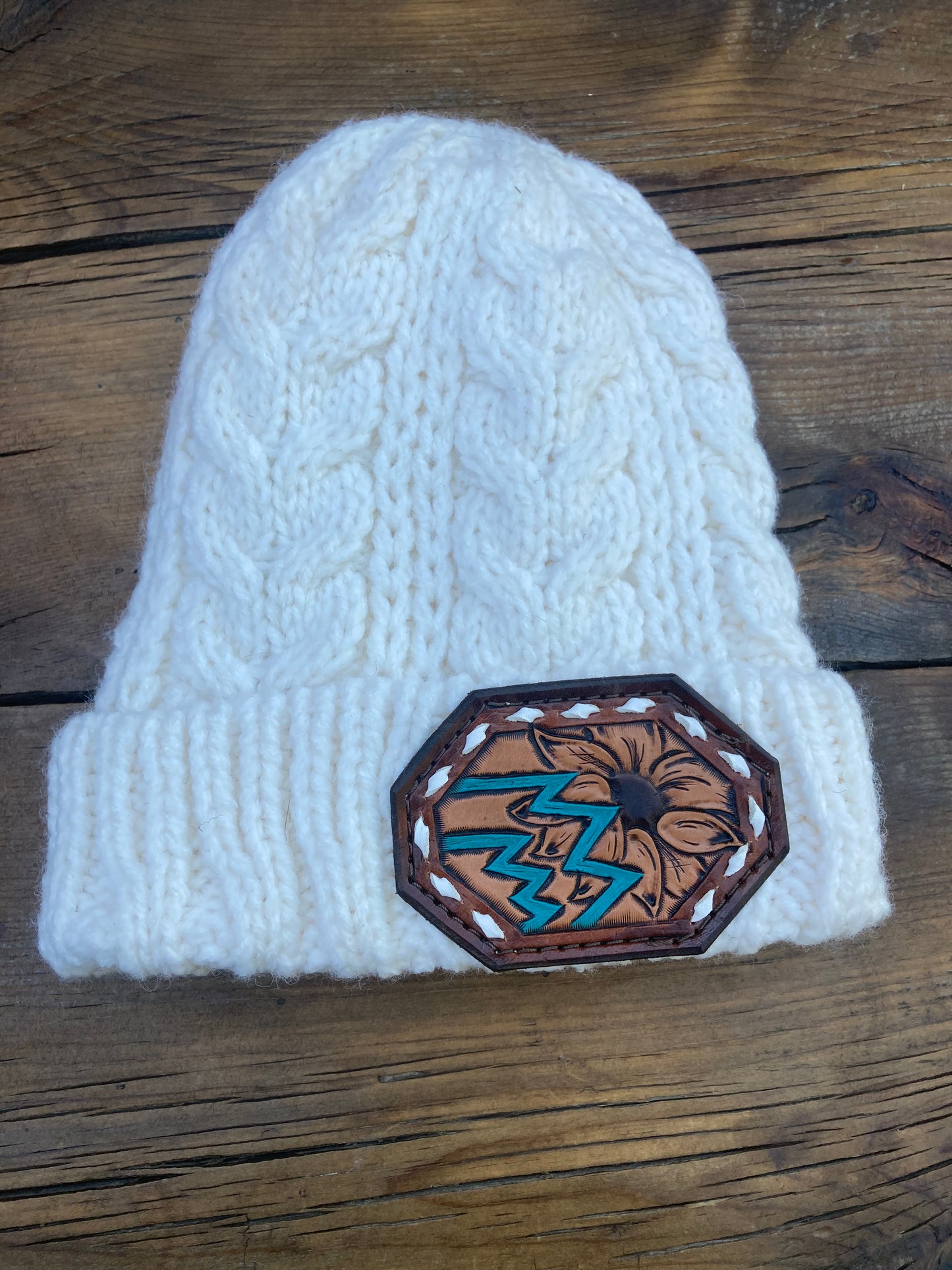 White beanie with sunflower leather patch