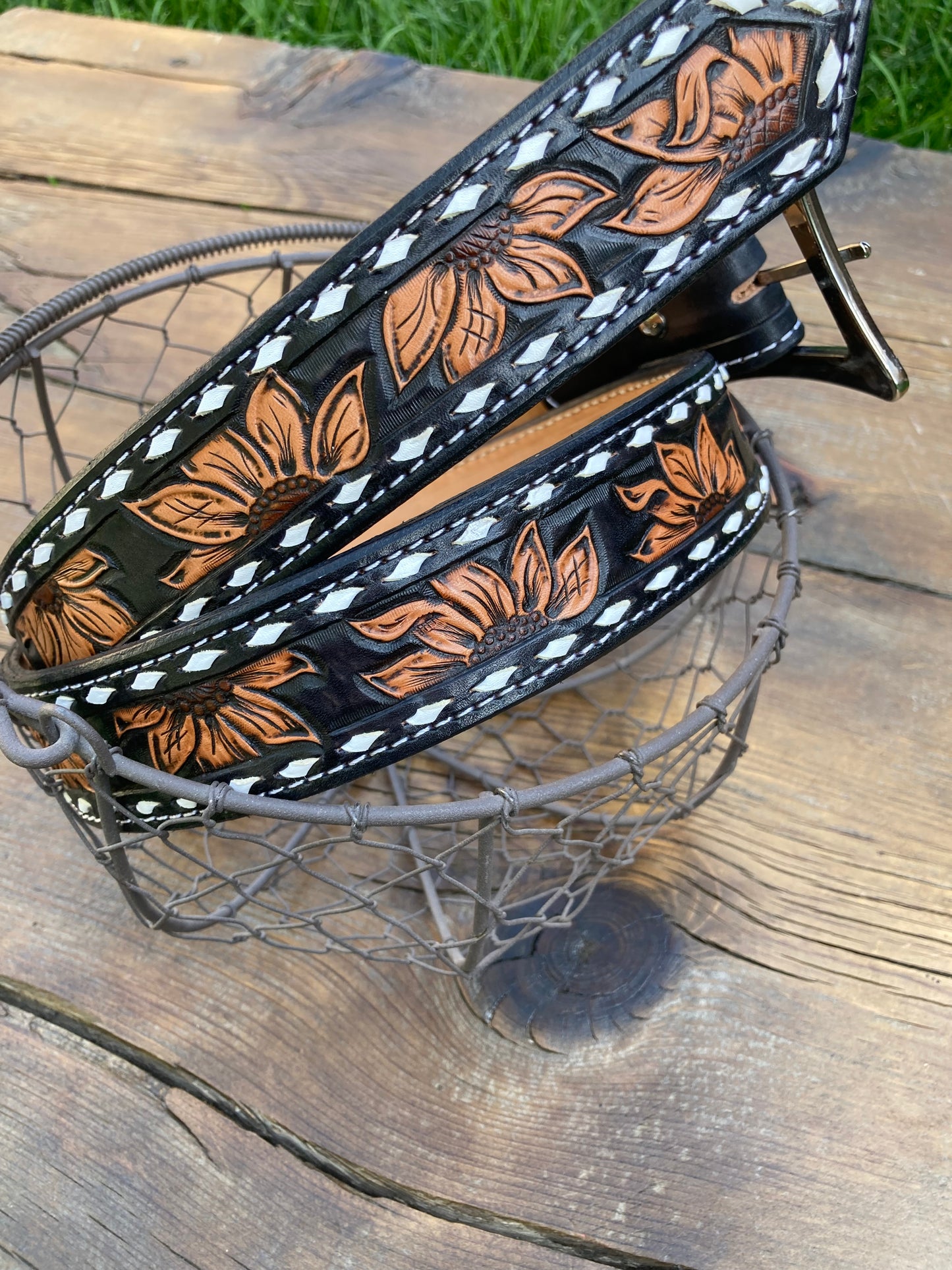 Black sunflower belt with white buck stitch