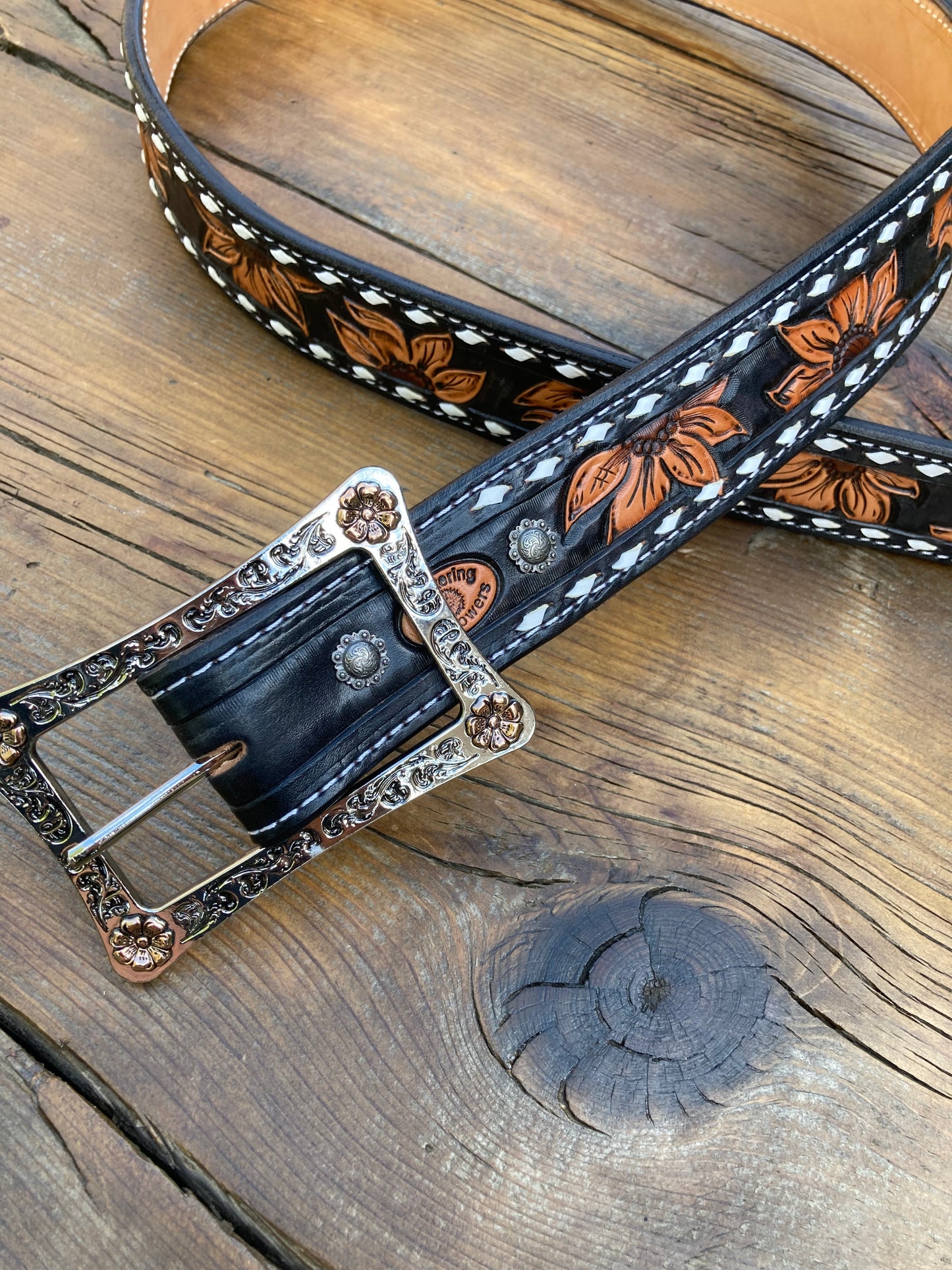 Black sunflower belt with white buck stitch