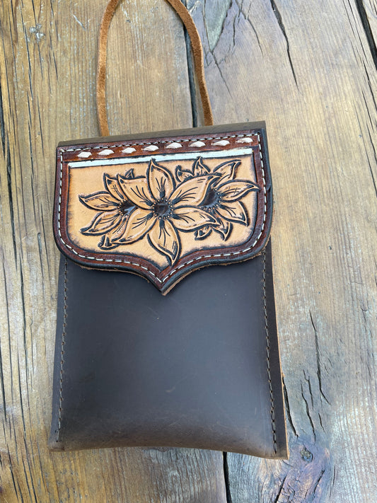 Saddle pouch cell phone holder