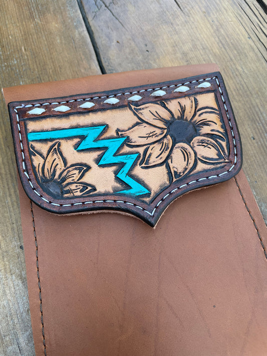 Saddle pouch cell phone holder