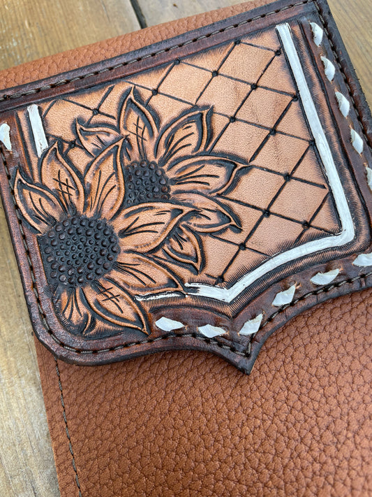 Saddle pouch cell phone holder