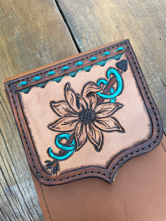Saddle pouch cell phone holder