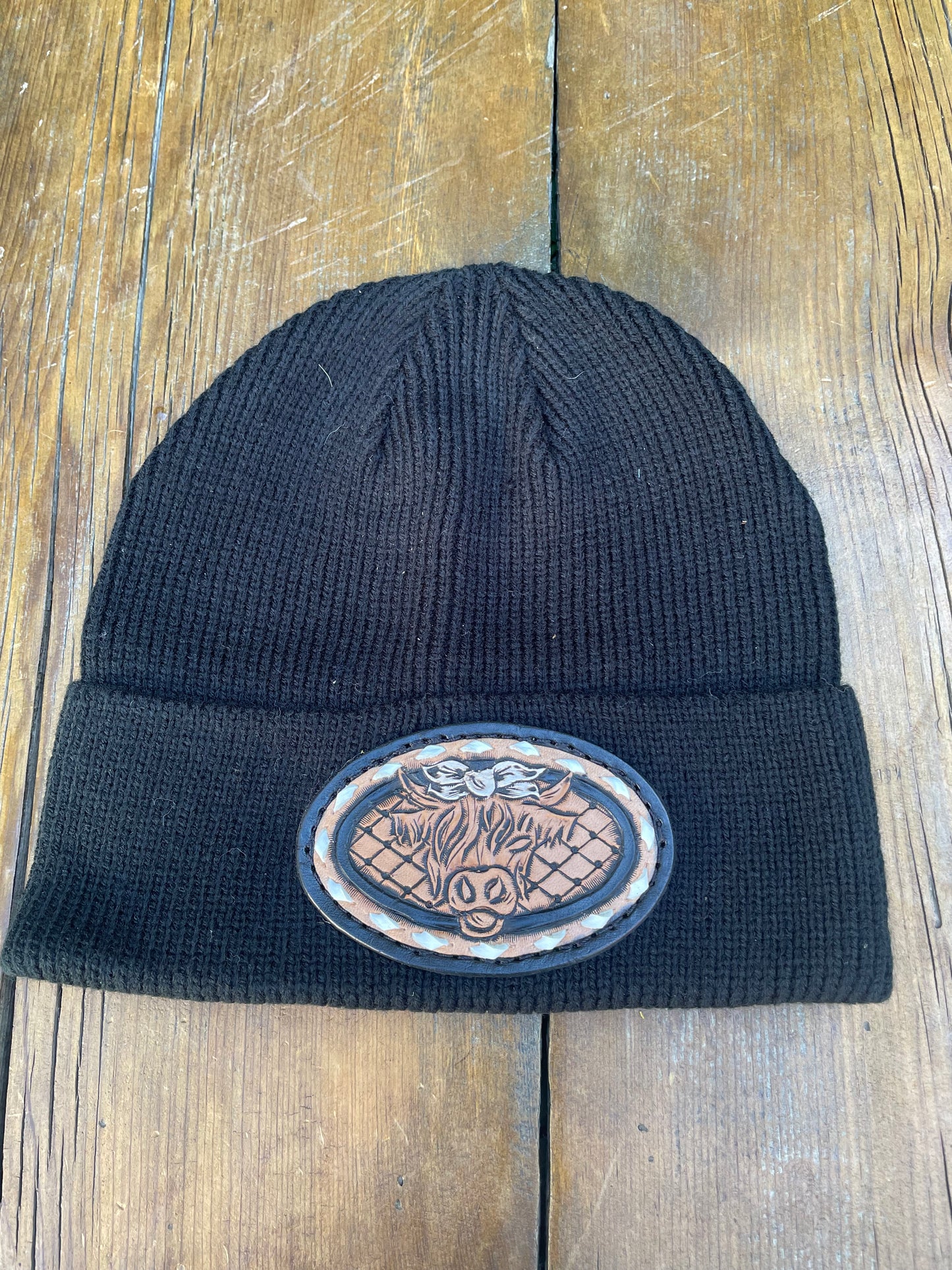 Black beanie with highlander and white buck stitch