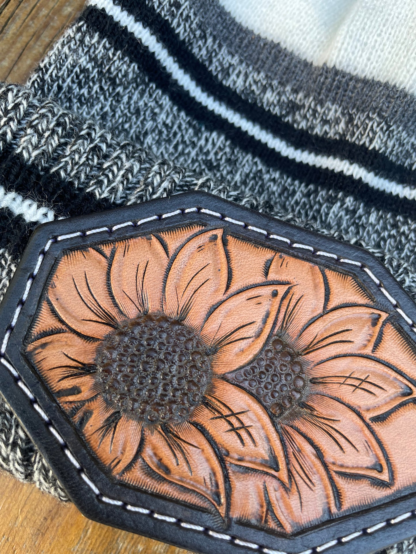 Black and gray striped beanie with sunflowers