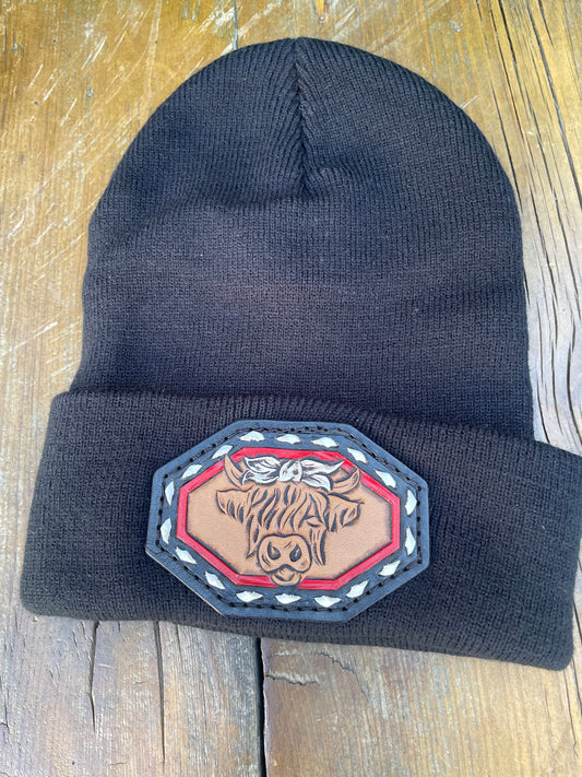 Black beanie with highlander cow and buck stitch