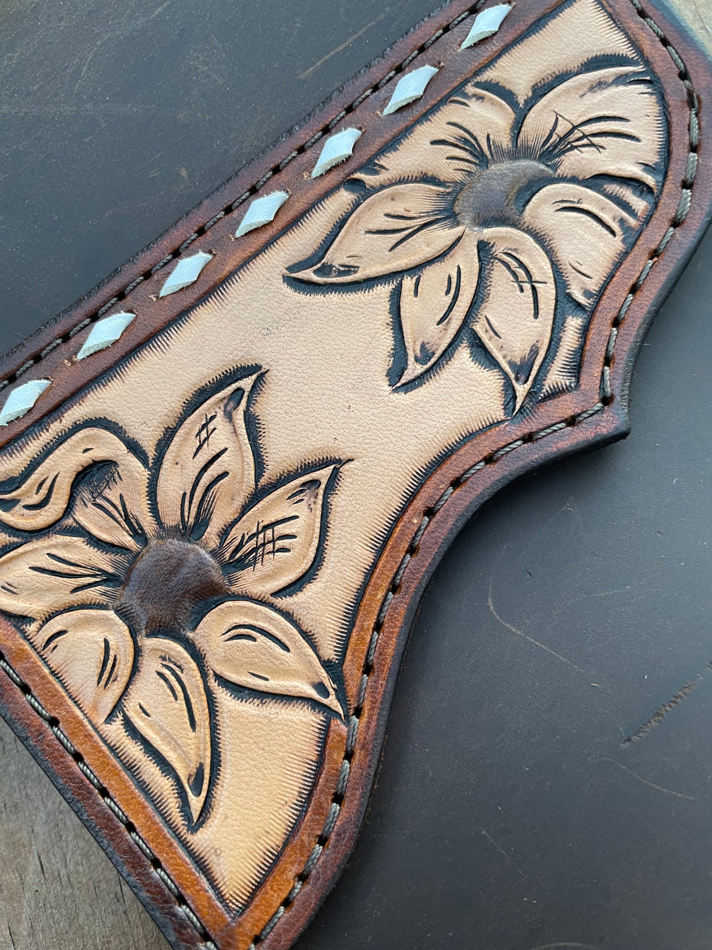 Saddle pouch cell phone holder