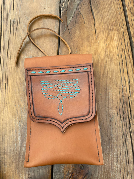 Saddle pouch cell phone holder