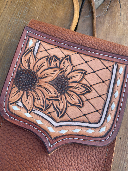 Saddle pouch cell phone holder