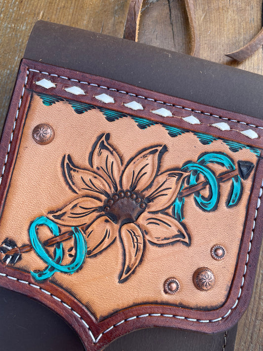 Saddle pouch cell phone holder