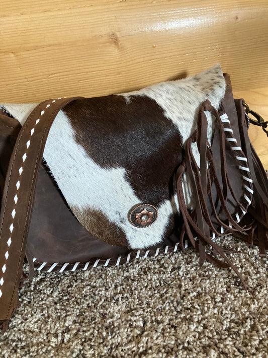 Purse with cowhide flap