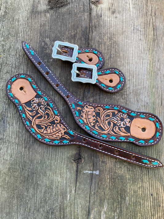 Spur straps with turquoise buck stitch and floral tooling